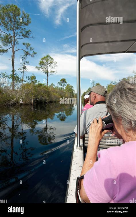 Tourists Taking A Boat Tour Of The Okefenokee Swamp Okefenokee