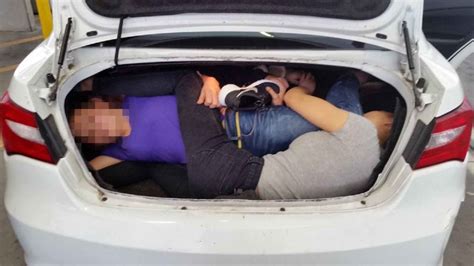 man tries to smuggle in 4 people across the border in car trunk cnn