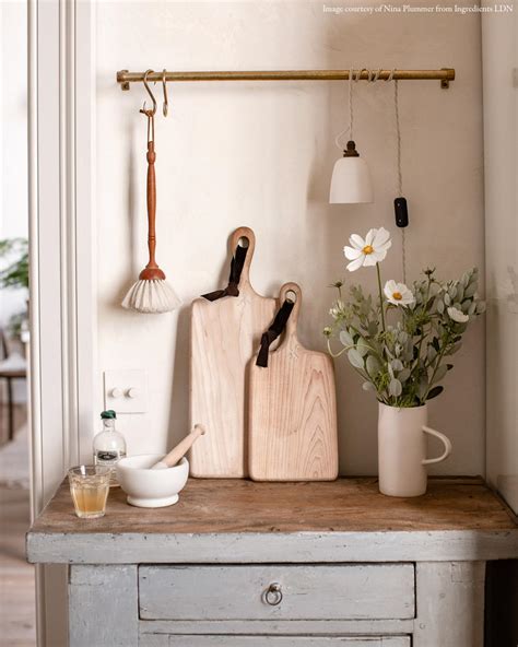 Hang the rest of the chair rail as you did in the previous step. deVOL Aged Brass Hanging Rail | deVOL Kitchens