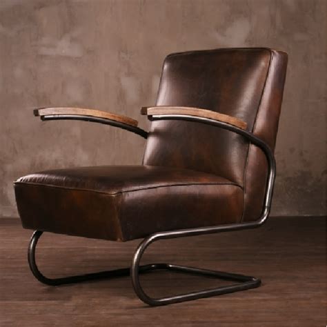The modern structure of our metal frame chair is the perfect contrast to its cush, tailored cushions, for a look that manages to read both industrial and glam. Metal Frame Antique Leather Armchair With Wood Arm - Buy ...