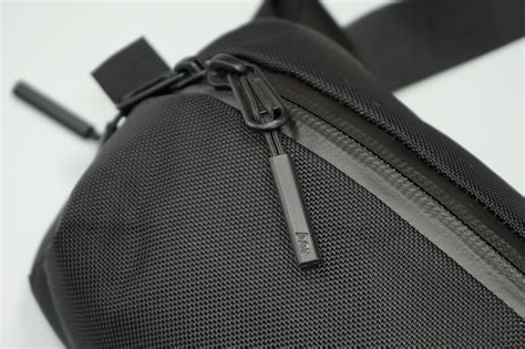 On the back, a hidden pocket keeps your passport or wallet safe and secure. Aer Day Sling 2 Review | Pack Hacker