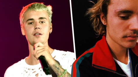 justin bieber now has a face tattoo that says grace above his eyebrow capital