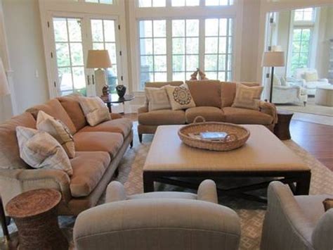 If your living room is dominated by a corner setting, make the most of it. Mrs. Howard: One of our favorite configurations for a ...