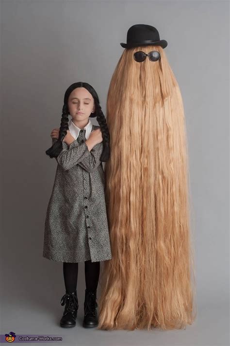 I wanted to make a cousin it costume and for this costume you will need a hat and lots of yarn and lots of hot glue. Wednesday Addams and Cousin It Costume - Photo 2/3