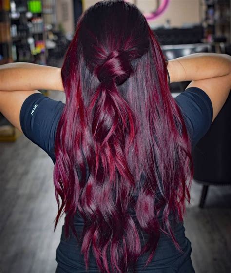 dark hair with bright burgundy red highlights red balayage hair wine hair color wine hair