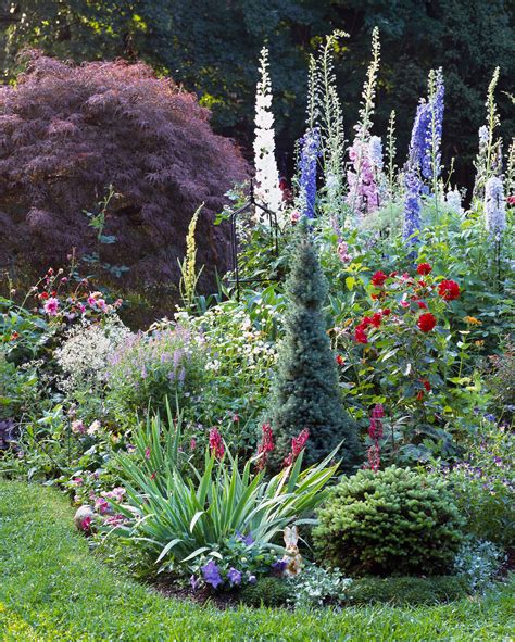 Cottage gardeners ignore traditional design elements. 6 Steps to a No-Work Cottage Garden | Better Homes & Gardens