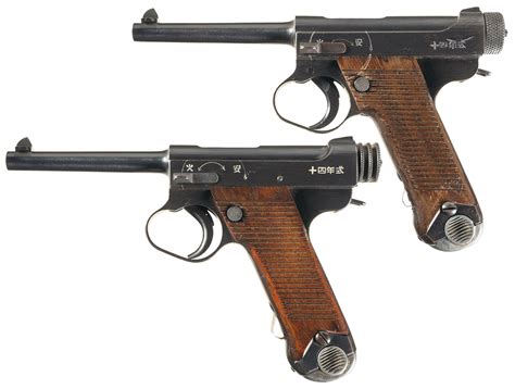 Two World War Ii Japanese Type 14 Semi Automatic Pistols W Hols Rock