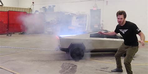 Tiny Tesla Cybertruck Smokes The Wheels Off A Ford F 150 In Insane Tug