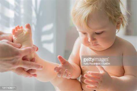 Mom Foot Massage Photos And Premium High Res Pictures Getty Images