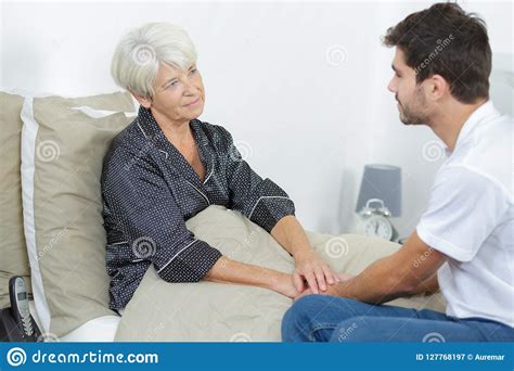 Old Woman At Hospital Ward With Assistant Stock Image Image Of Smile
