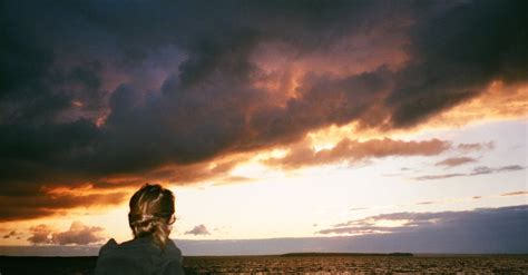 Woman Facing Body Of Water · Free Stock Photo