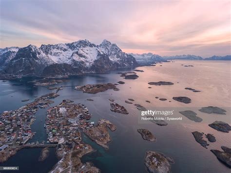 Aerial View Of The Fishing Village Of Henningsvaer Surrounded By Cold