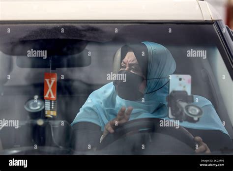 The First Female Palestinian Taxi Driver In The Gaza Strip Nayla Abu Jubbah 39 Sits At Her