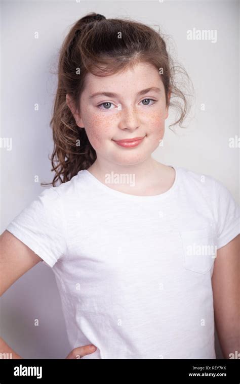 Portrait Of Pretty Scottish 10 Year Old Girl With Freckles Stock Photo