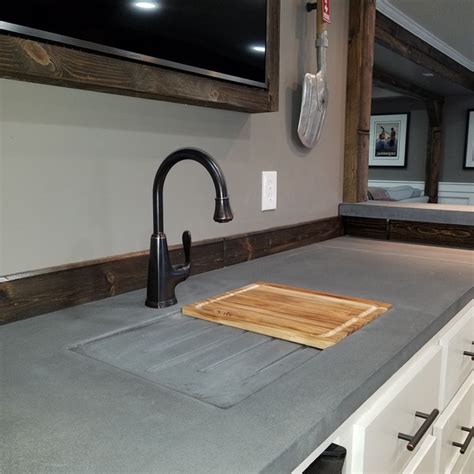 When talking about a specific meal, we usually use the verb make. Built-in Drain Board and Cutting Board hide Integrated Concrete Sink - Contemporary - Home Bar ...