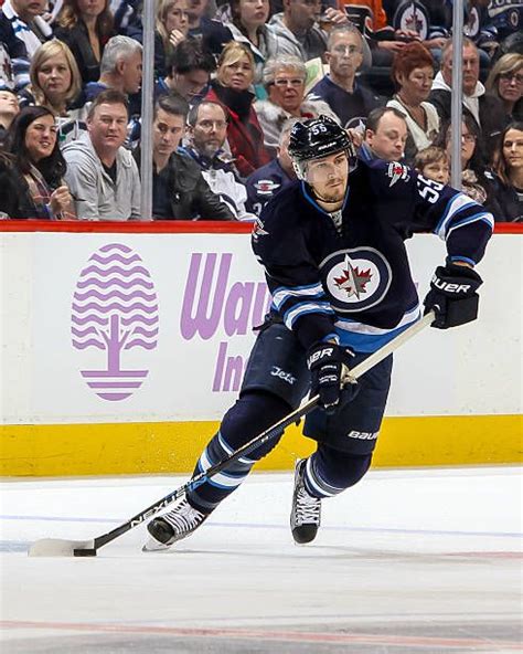 mark scheifele of the winnipeg jets plays the puck down the ice during secondperiod action