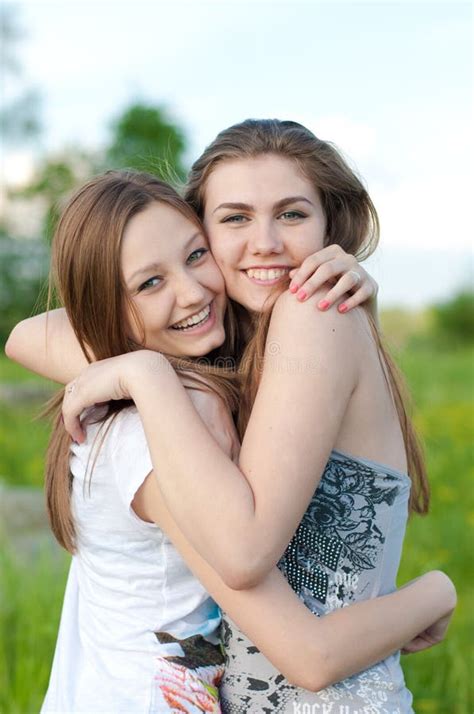 Beautiful Young Women Hugging Outdoors Stock Image Image Of Friends Brunette 24985673