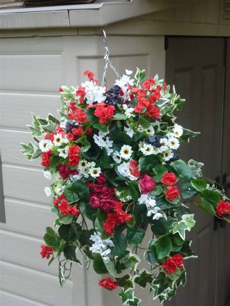 To enliven the interior and introduce some colour. Hanging basket large with artificial geranium & begonias ...