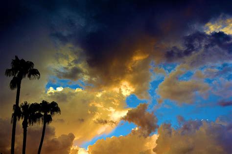 Stormy Skies At Sunset Photograph By Nancy Jenkins Fine Art America