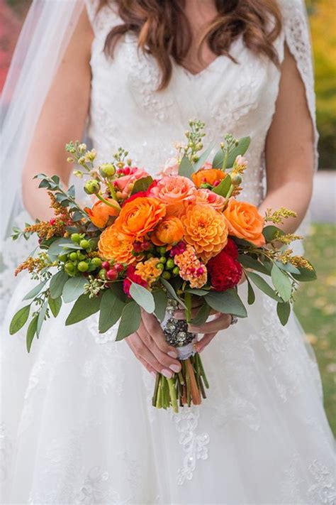 Picking wedding bouquets isn't easy unless you're actually a florist. Casual and Elegant Fall Wedding | Orange wedding flowers ...