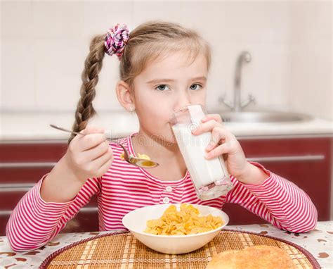 Cute Little Girl Having Breakfast Drinking Milk Stock Image Image Of