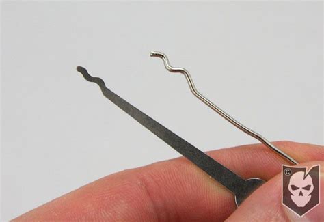 A normal size paper clip or the tiny ones lock pick making: How to Make a Paperclip Lock Pick that Works | Paper clip, Diy lock, Lock picking tools