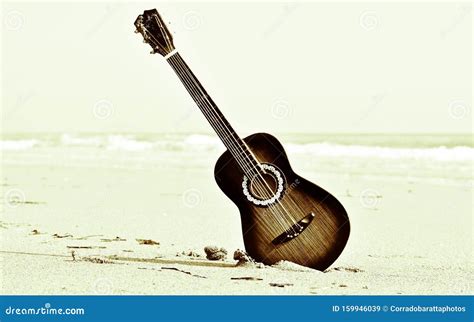 An Ancient Guitar On The Beach Stock Image Image Of Jamaica Bangkok
