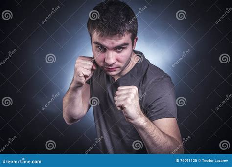 Strong Young Man In A Fighting Pose Stock Image Image Of Defense