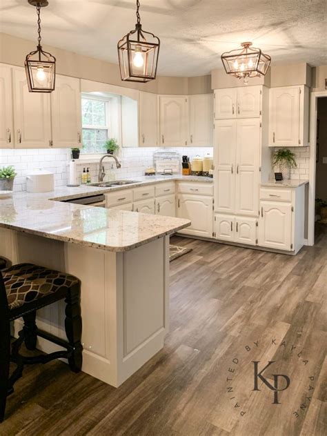 Super white, benjamin moore considered to be the brand's whitest white, this one achieves a crisp look thanks to the fact that there are no visible undertones. Favorite White Kitchen Cabinet Paint Colors - Evolution of ...