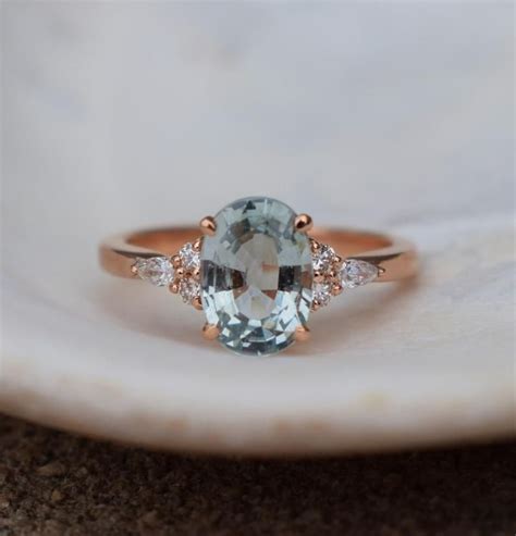 This beauty is set in eidelprecious signature 14k rose gold diamond setting, Mint sapphire engagement ring. Eidelprecious Campari ring. | Gold band engagement rings, Blue ...