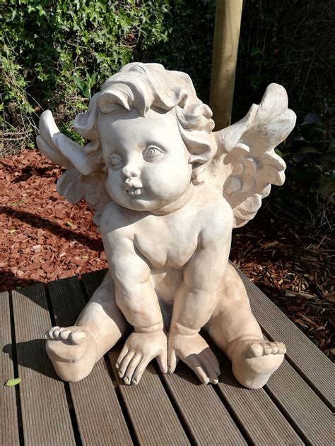 Garden Sculpture Of An Angel Cherub