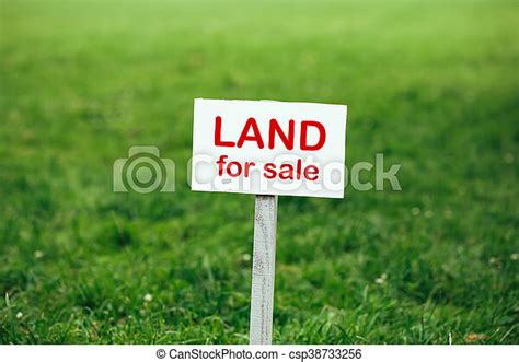 Land For Sale Sign Against Trimmed Lawn Background Canstock