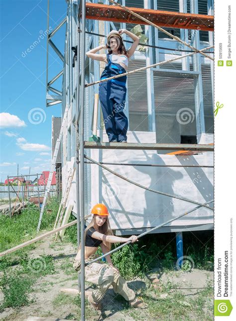 two attractive women on construction site stock image image of holding home 50915669