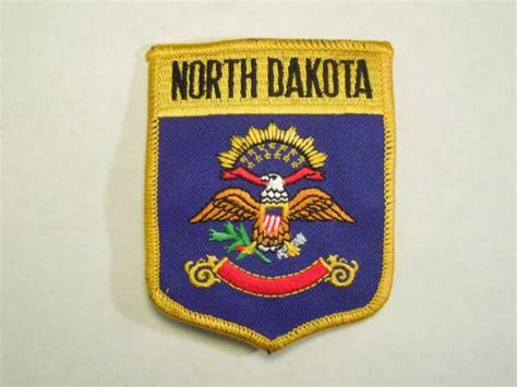North Dakota State Flag Shield Shape Iron On Patch State Coat Of Arms