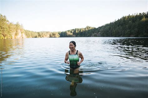Portrait Of Smiling Active Woman After Swimming In A Lake By Rob And
