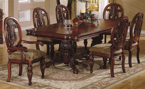 Classic furniture dining room sets consist of eight chairs, a showcase, a table and a console with mirror. Cherry Finish Traditional Dining Room w/Hand Carved Details