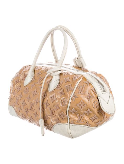 See and discover other items: Louis Vuitton Bouclettes Speedy Round Bag - Handbags - LOU137486 | The RealReal