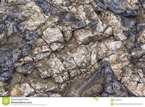 Macro Detail Of Layered Multi Color Rock Stock Photo