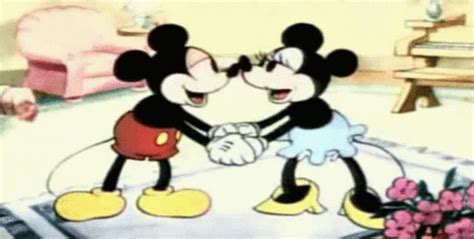 Mickey And Minnie Happily Kissing In The 1933 Short Puppy Love