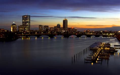 Evening Scene Of The City Peaceful Sea Warm And Turned On Lights