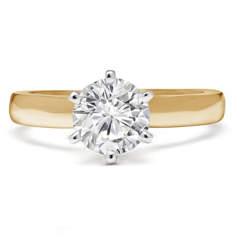 round cut diamond solitaire cathedral set 6 prong engagement ring in yellow gold 2544l y