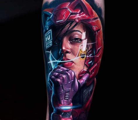 A Woman With A Helmet On Her Head Is Depicted In This Tattoo Design By