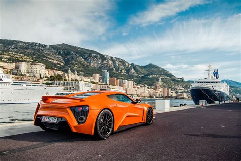 A cool collection of cars. 2009 Zenvo ST1 tours Monaco supercar car sports orange ...