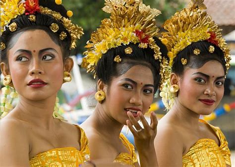 Close Up Portraits Of Young Balinese Women Wearing Traditional Costumes