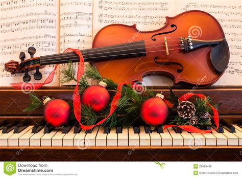 Learn to tune the violin while playing and how to find the right pitch. Holiday Violin And Piano Royalty Free Stock Image - Image ...