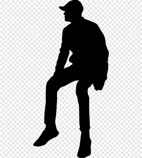 Silhouette Man Sitting On Ground
