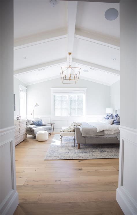 While high ceilings are architecturally appealing, they present challenges for installing light fixtures, so consider these vaulted ceiling lighting options. vaulted, ceiling, master bedroom, brass chandelier, board ...