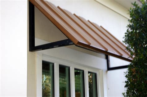 An awning or overhang is a secondary covering attached to the exterior wall of a building. Metal Canopies And Awnings