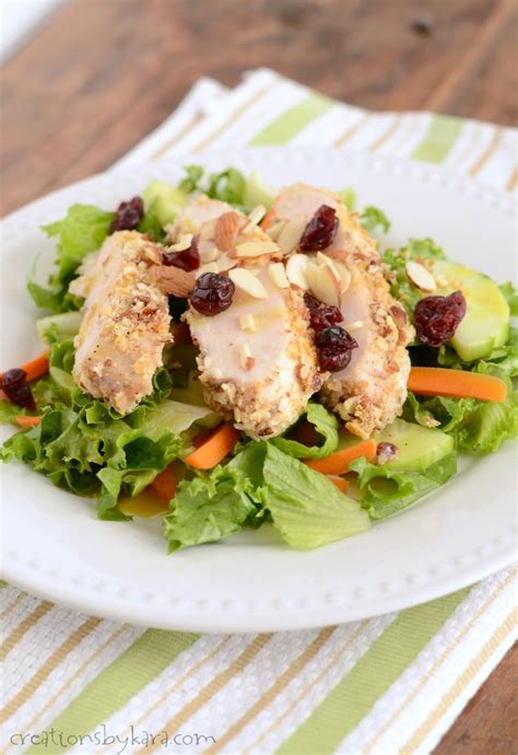 Combine ground pecans and red pepper in a shallow bowl. Recipe for pecan crusted chicken served on top of salad ...
