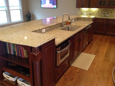 If you have a dishwasher, make sure to place the nearest edge of the dishwasher within 36 inches of the nearest edge of your sink. A 12' island contains the sink, dishwasher and microwave ...